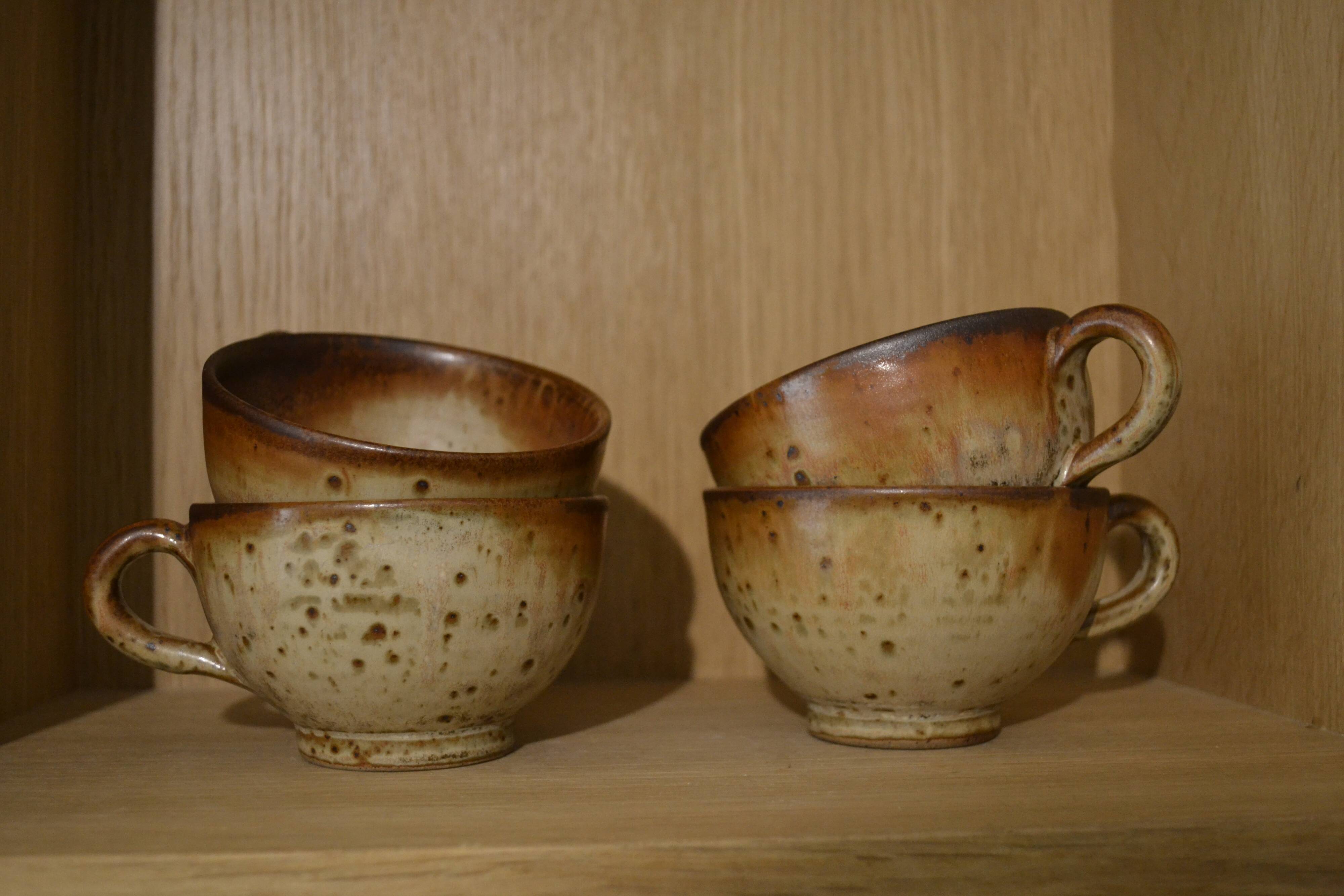 Set of 4 signed sandstone cups