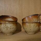 Set of 4 signed sandstone cups