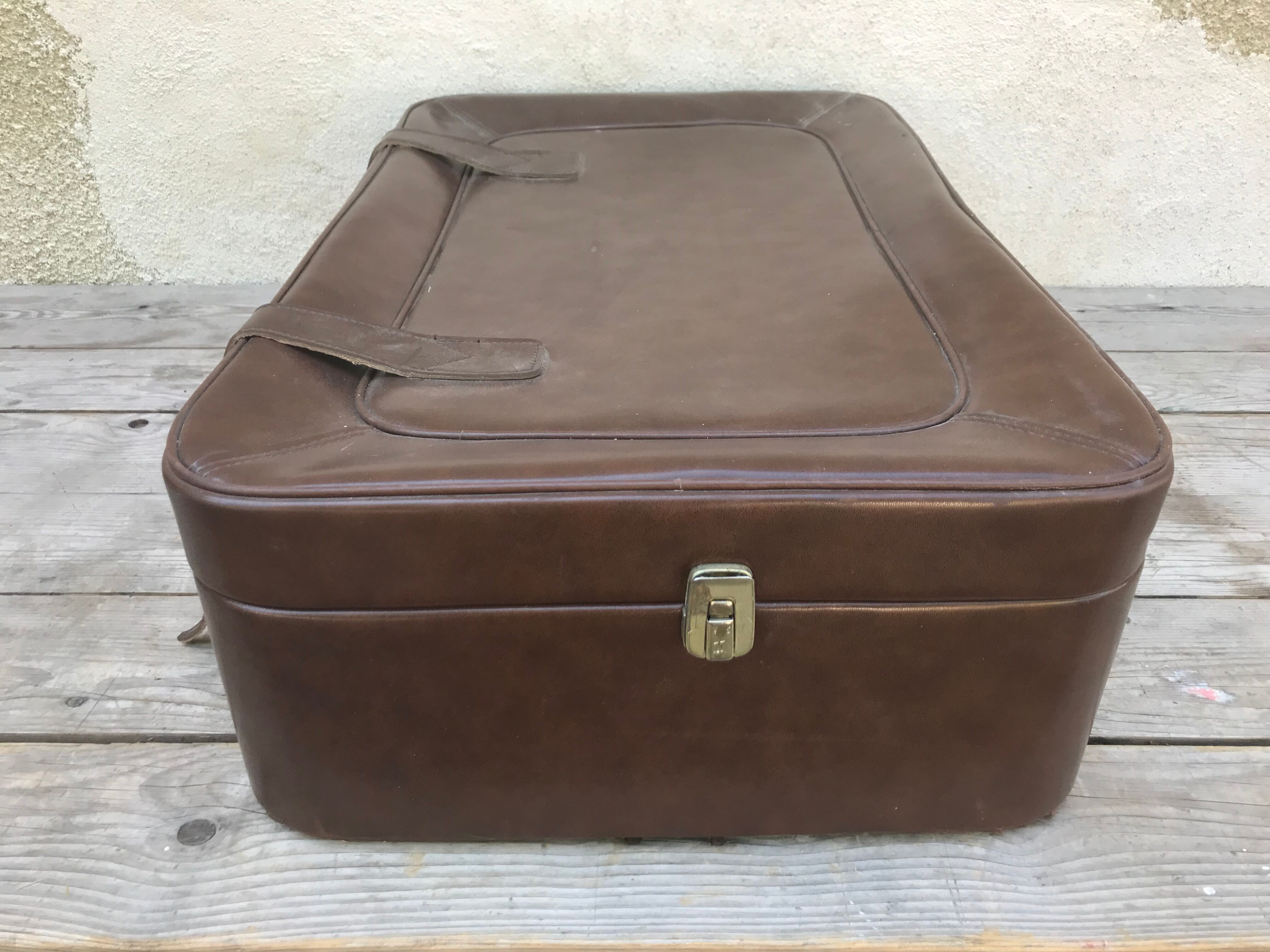 Old suitcase travel leather brown