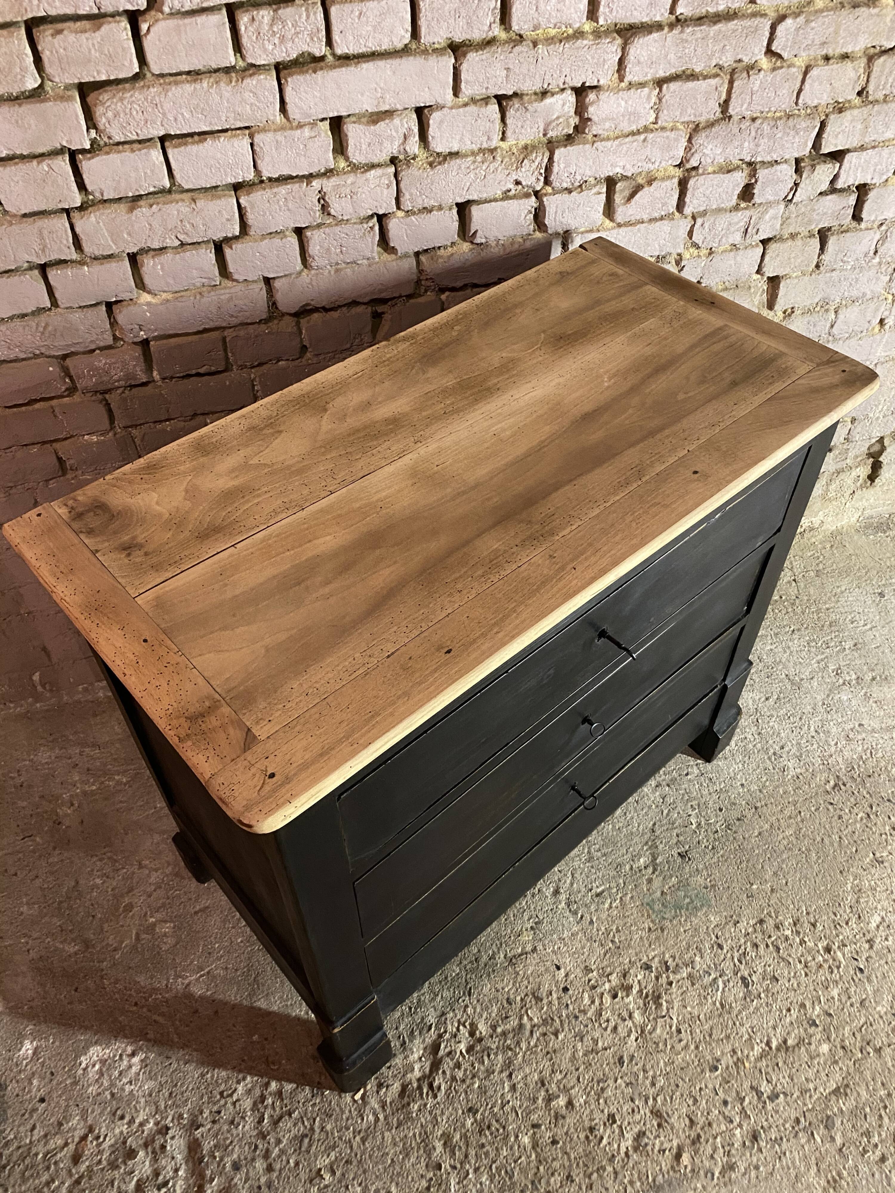 Old black patinated chest of drawers