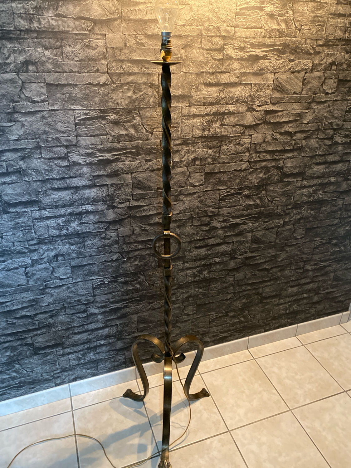 Brutalist floor lamp in twisted iron