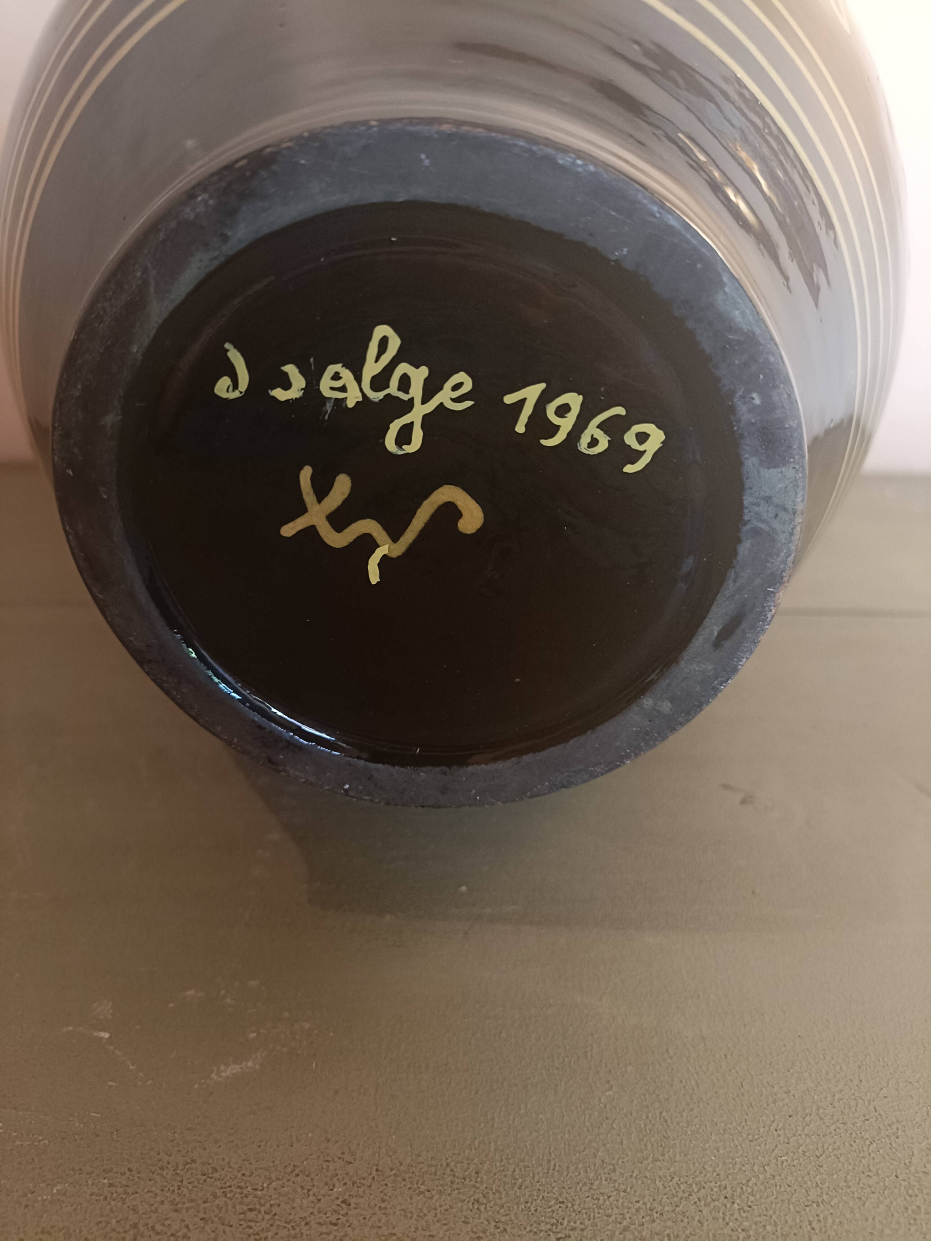 Large glazed terracotta pitcher with floral decoration