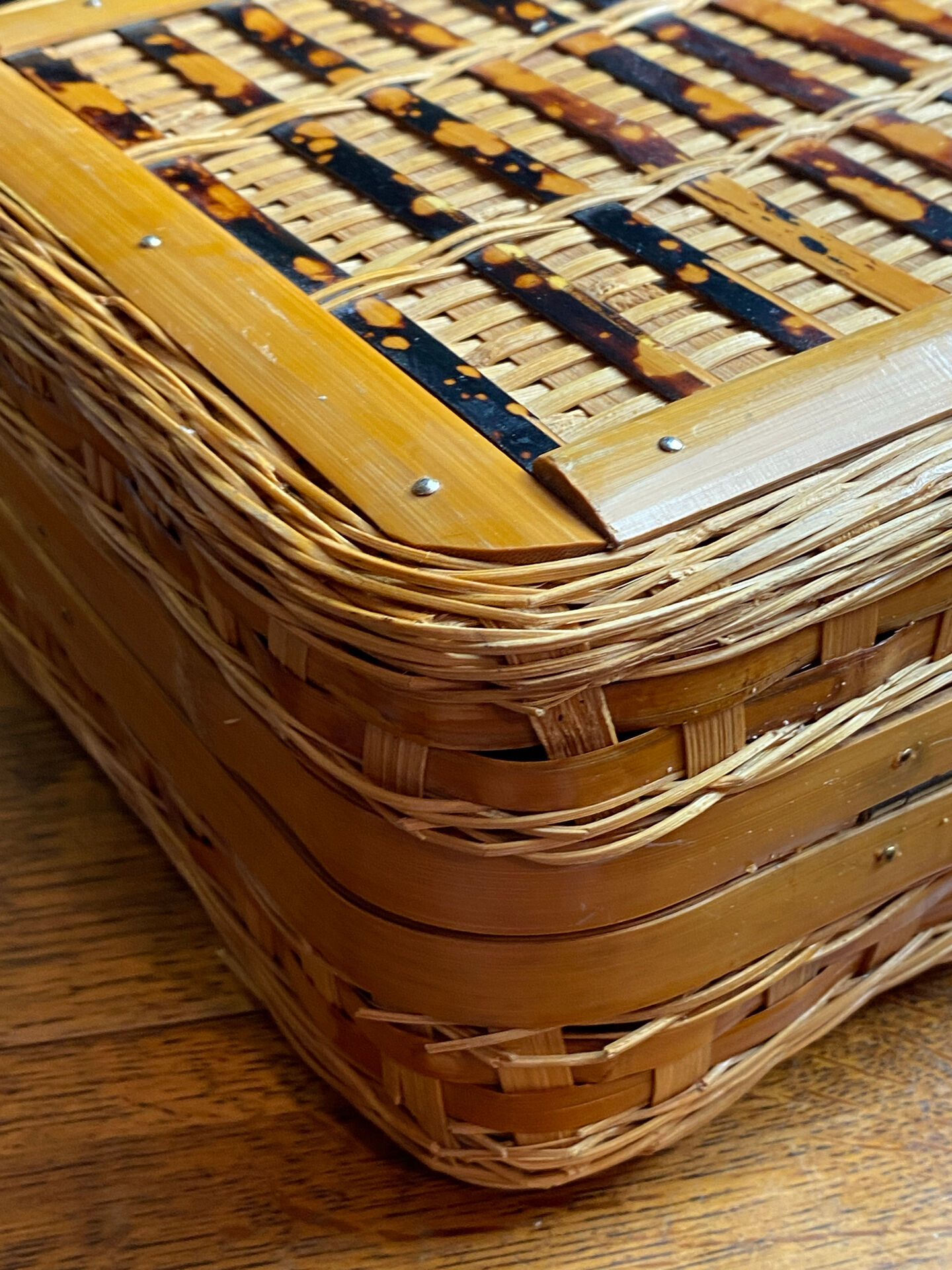 Wicker and wood suitcase