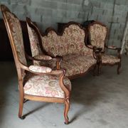 Three-piece walnut living room set consisting of two armchairs and one sofa
