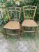 Two caned bistro chairs