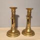 Two pusher candlesticks