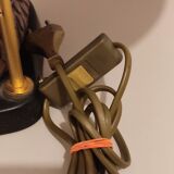 Decorative table lamp with a sculpted duck-shaped base and painted finish.