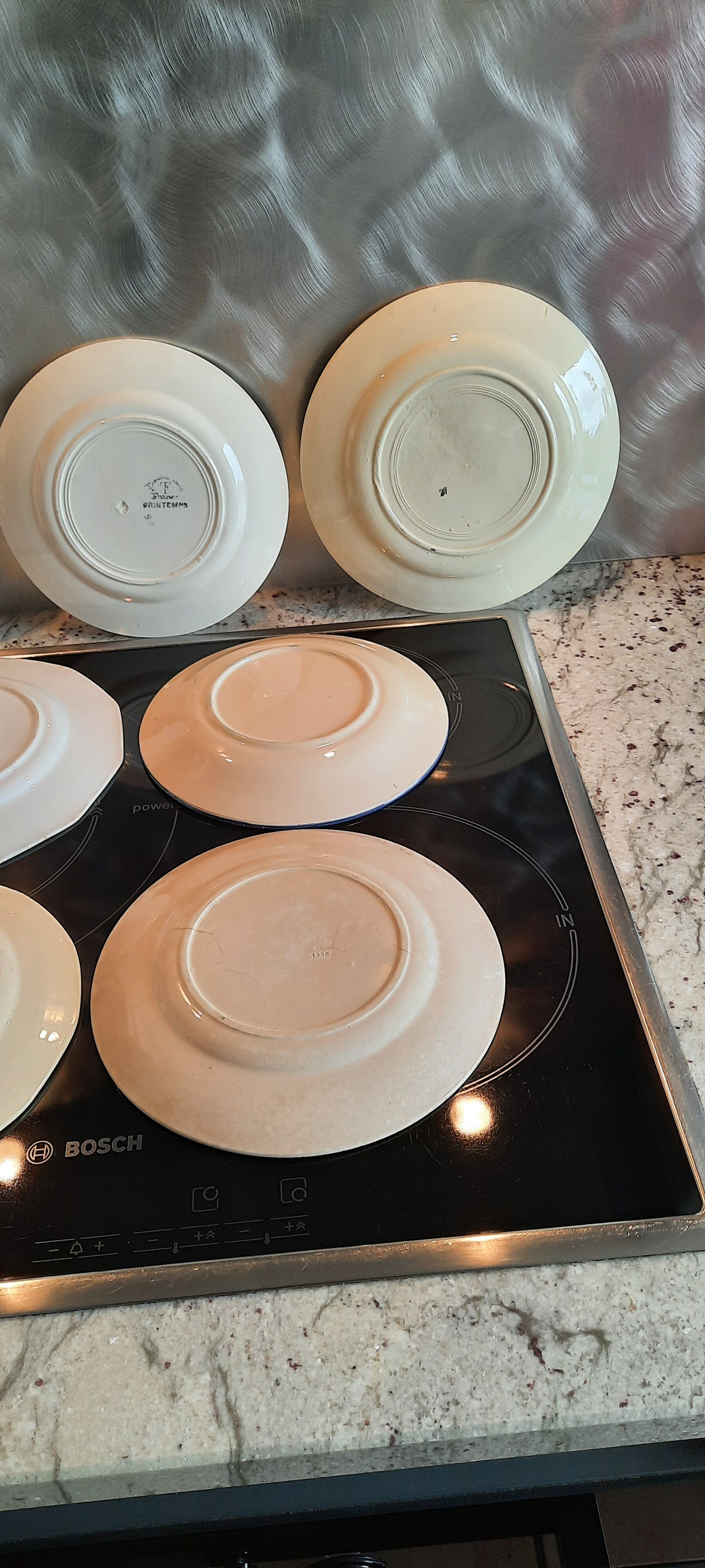 Old flat faience plates