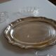Silver-plated metal aperitif serving tray with HKE hallmark and glass.