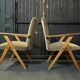 Pair of compass leg armchairs in velvet from the 1950s.
