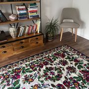 White vintage floral rug made by hand in Romania, beautiful flowers