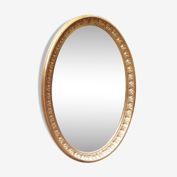 Miroir ovale en bois sculpté doré - 110x75cm