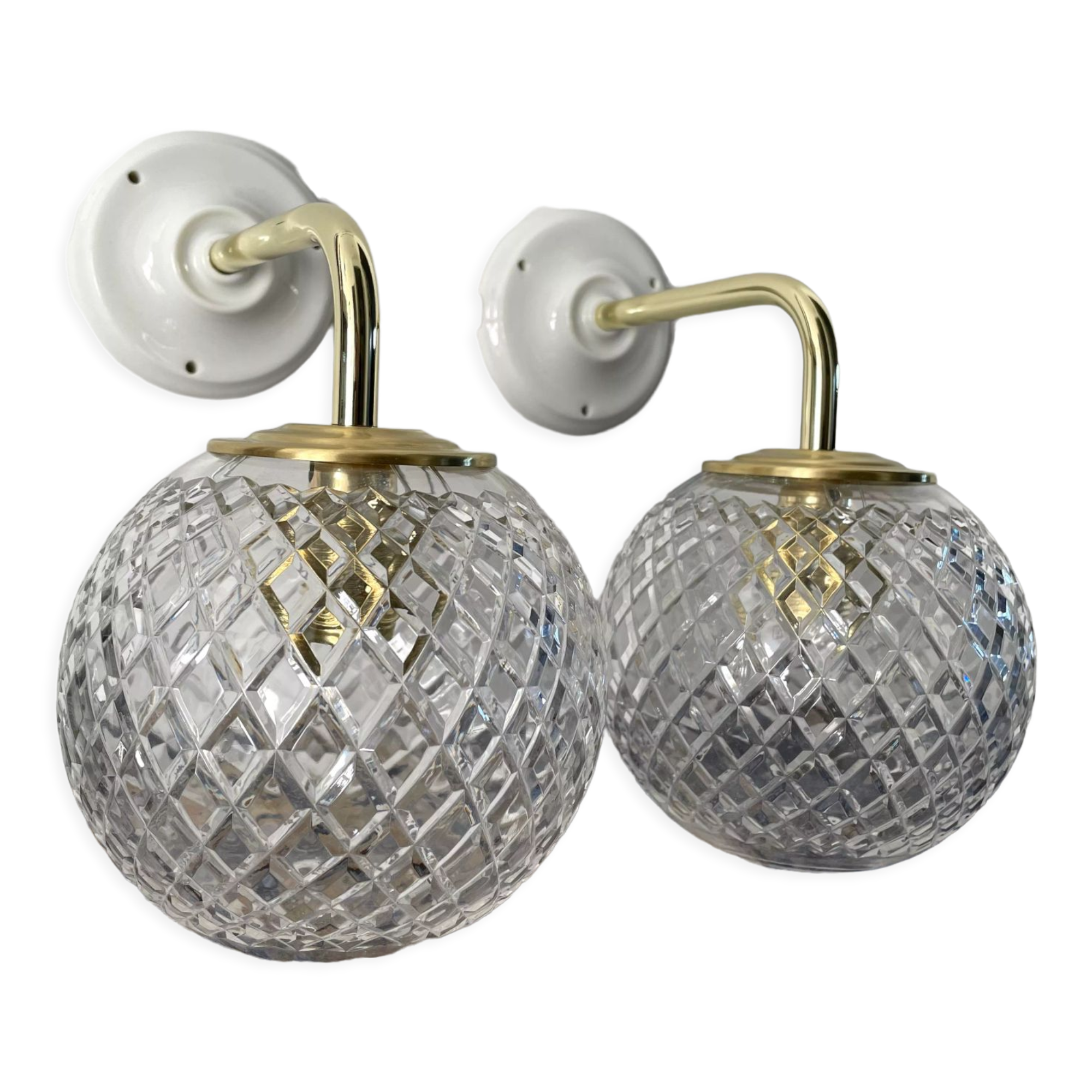 Set of two new electrified chiseled glass globe sconces