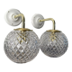 Set of two new electrified chiseled glass globe sconces