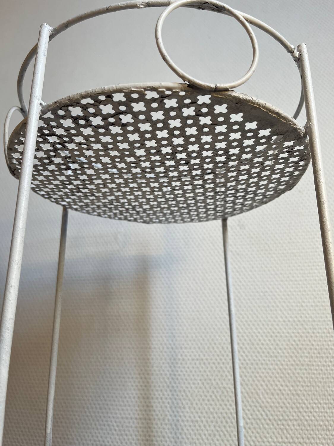 White perforated metal side table