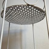 White perforated metal side table