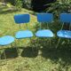Lot of chairs and blue rockabilly stools