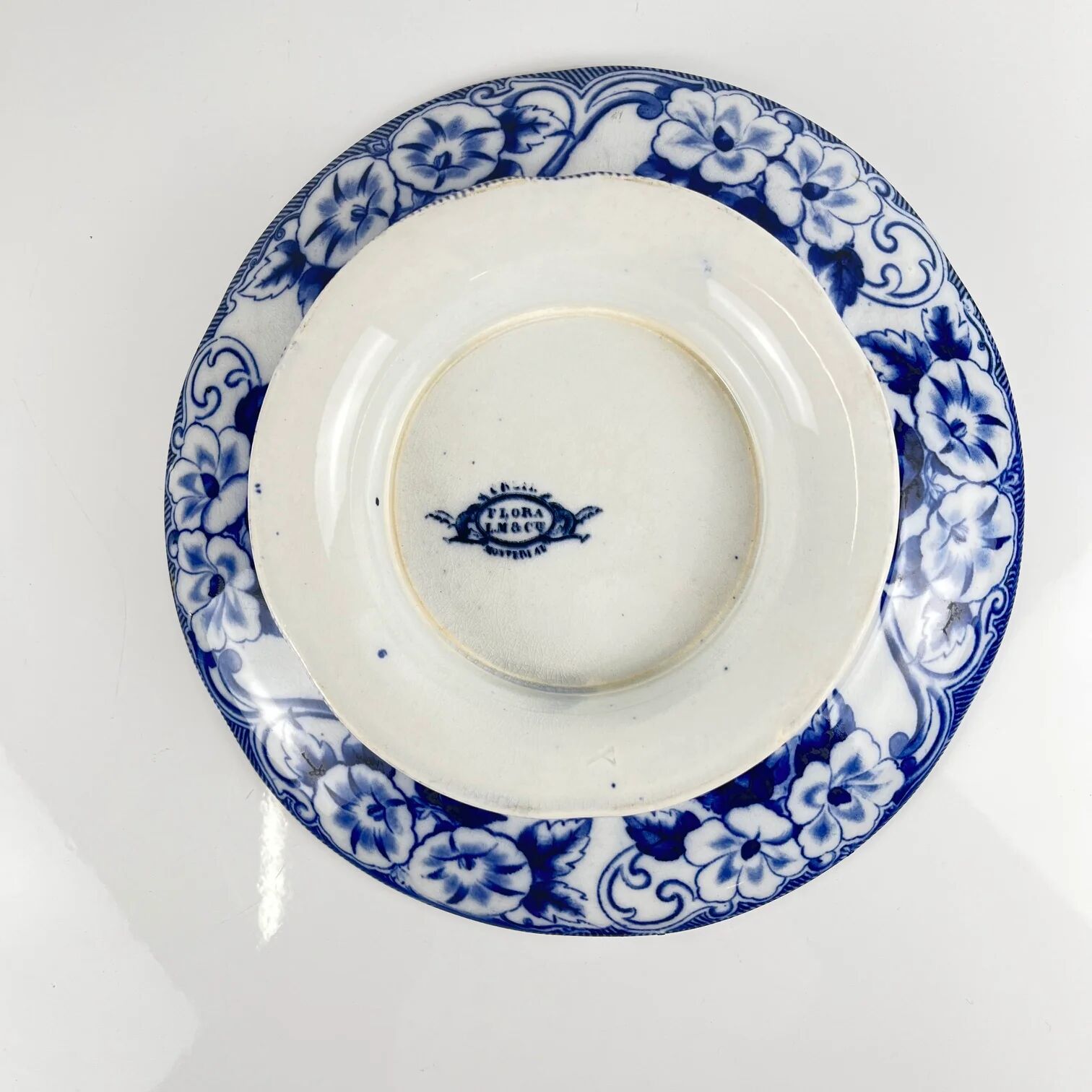 Plate on pedestal in ironstone "Flora" – Creil and Montereau, 19th century, blue