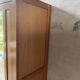 Vintage Parisian wardrobe with one mirrored door from the 60s in pine and wood