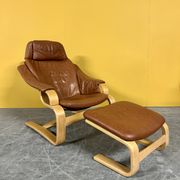 Danish vintage cognac leather armchair and footstool by Skipper Mobler