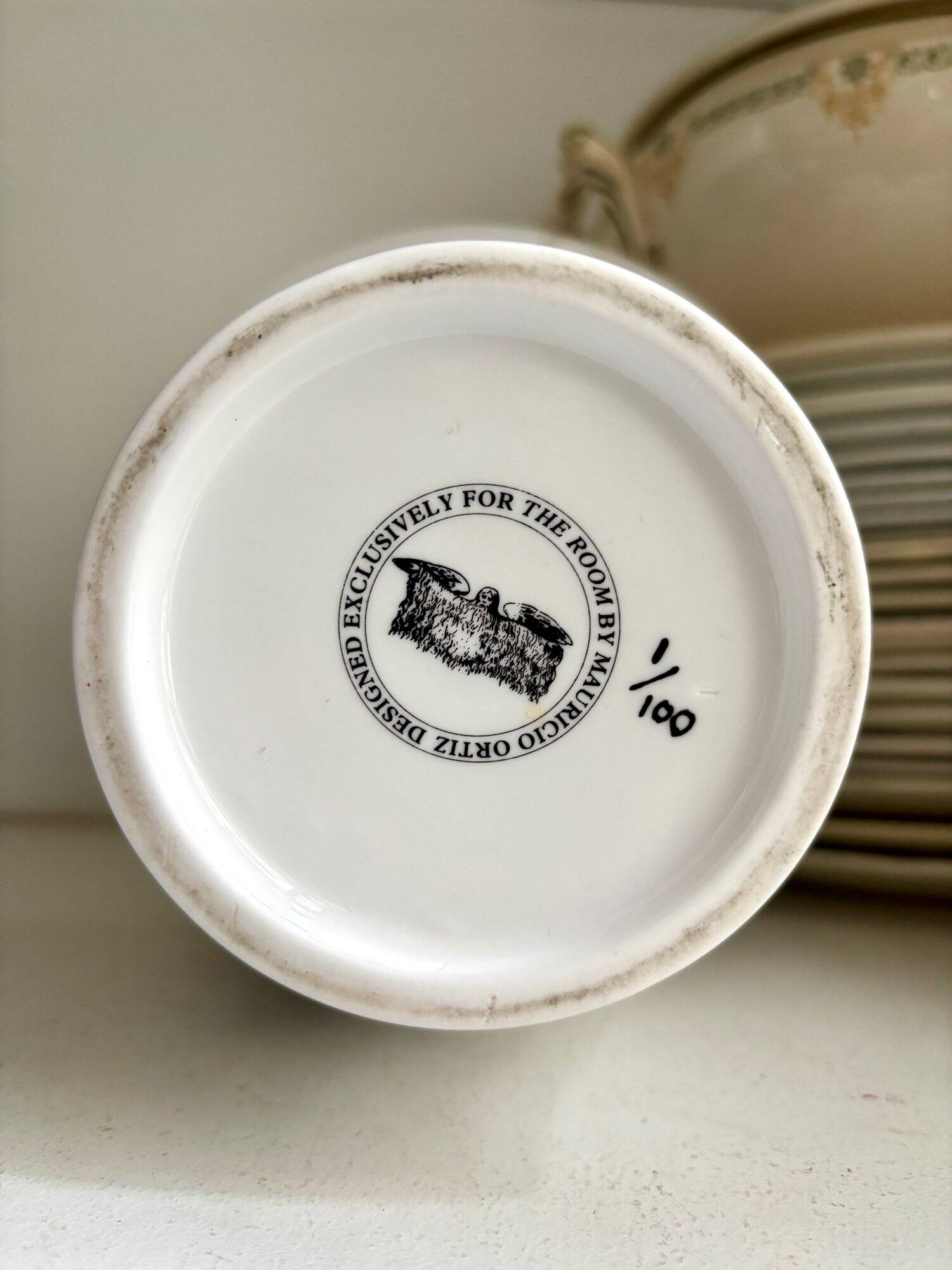 White and gold porcelain vase with black patterns by Mauricio Ortiz