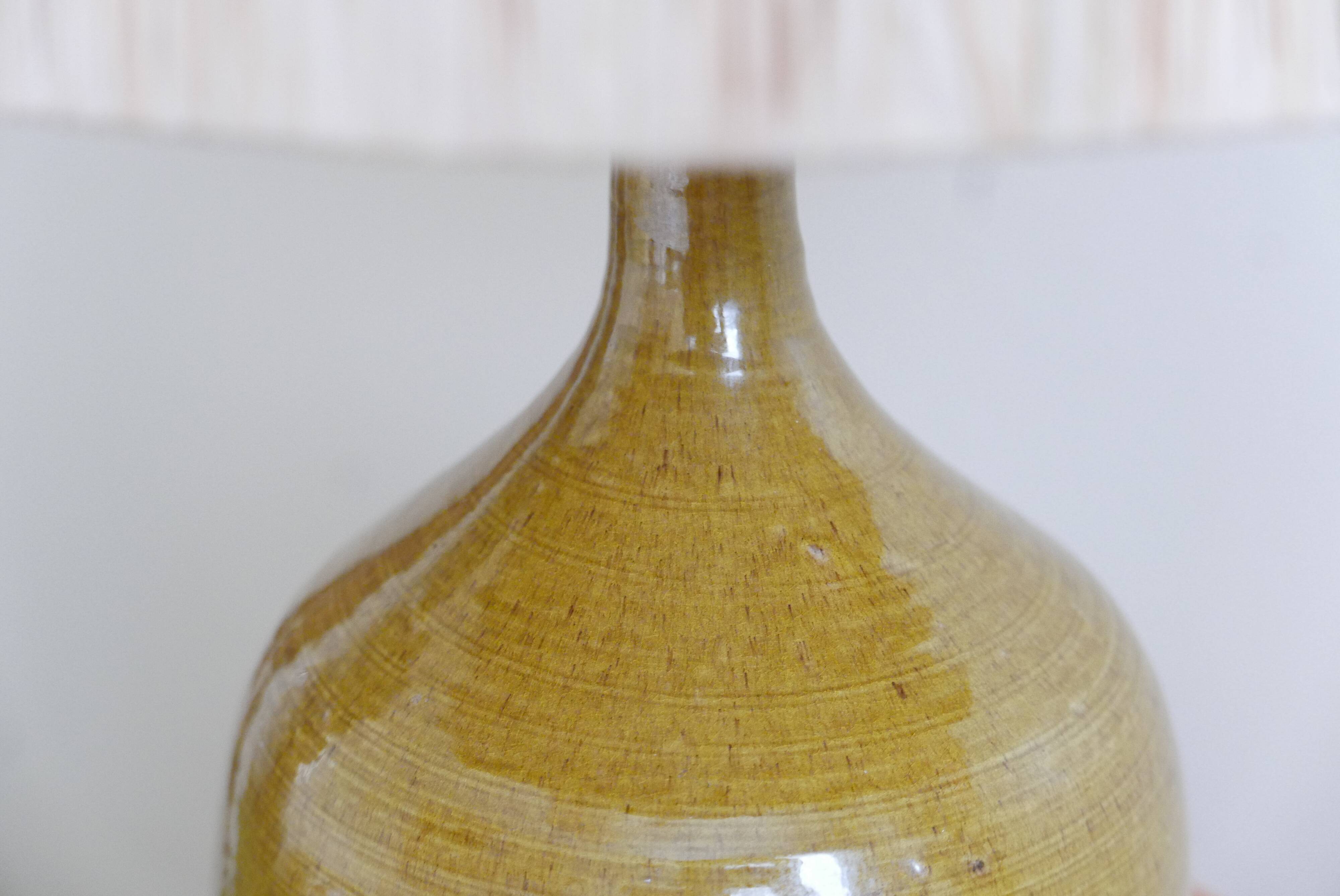 Aniseed green ceramic pottery lamp, raffia lampshade, 70s