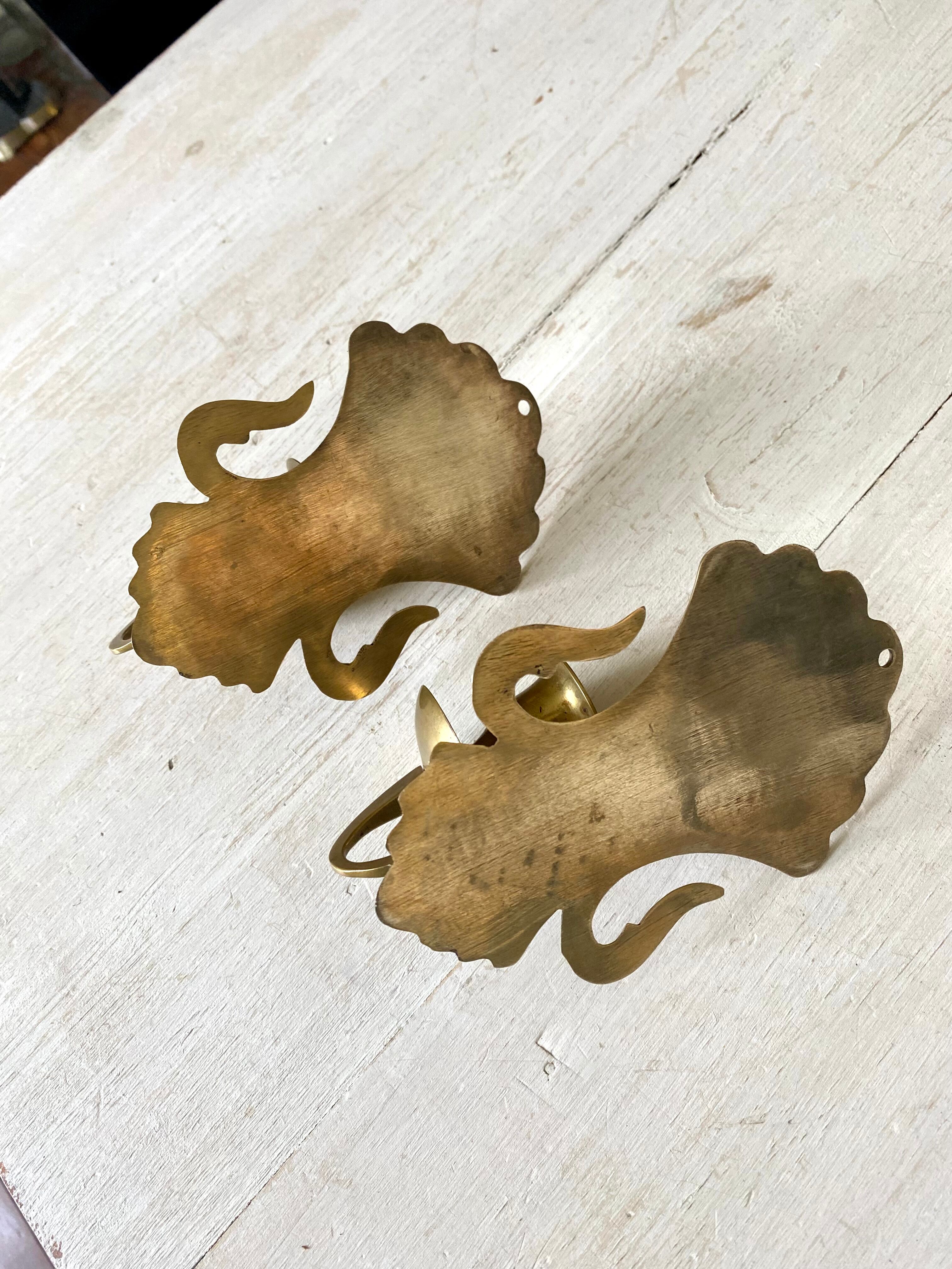 Pair of brass wall candle holders