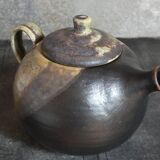 Vintage enameled stoneware potter's teapot