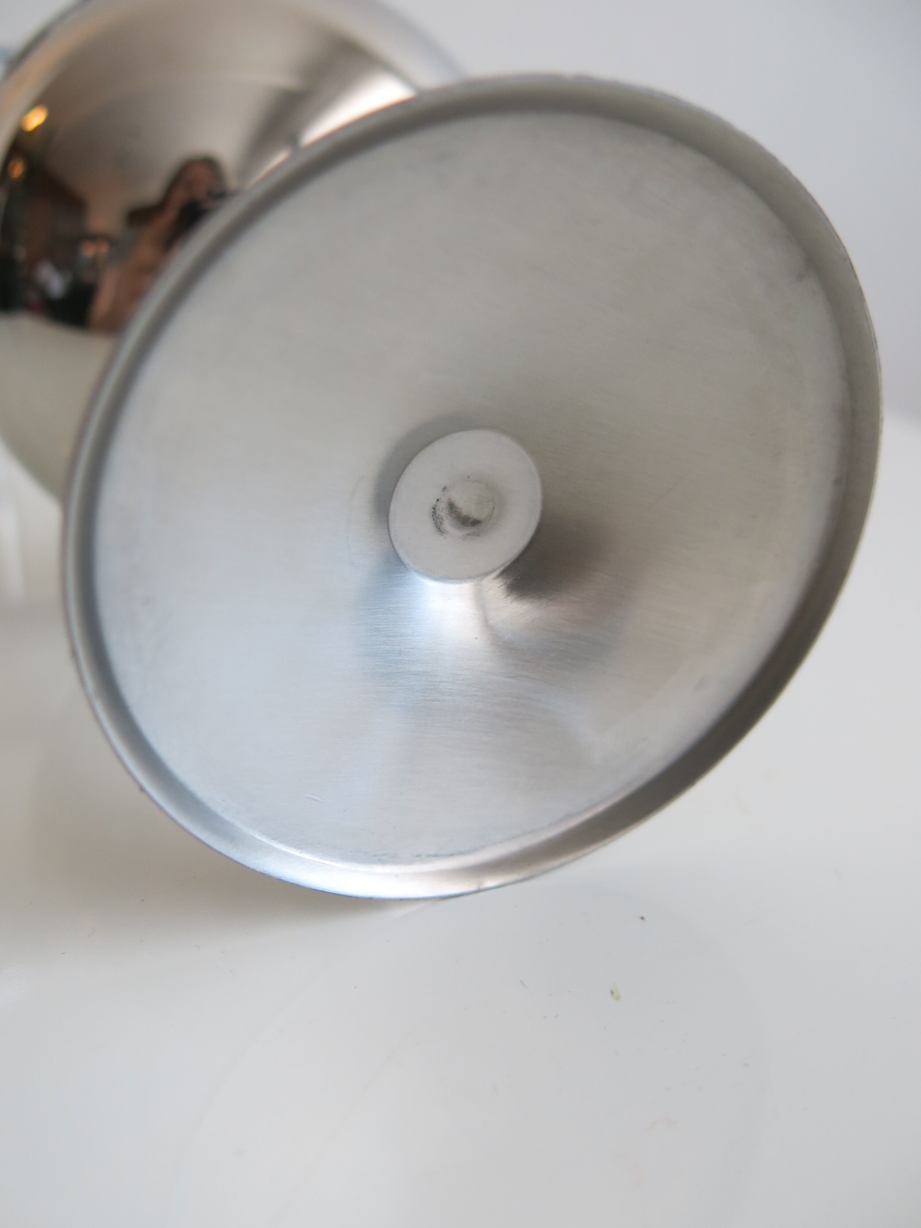 Set of six stainless steel standing cups