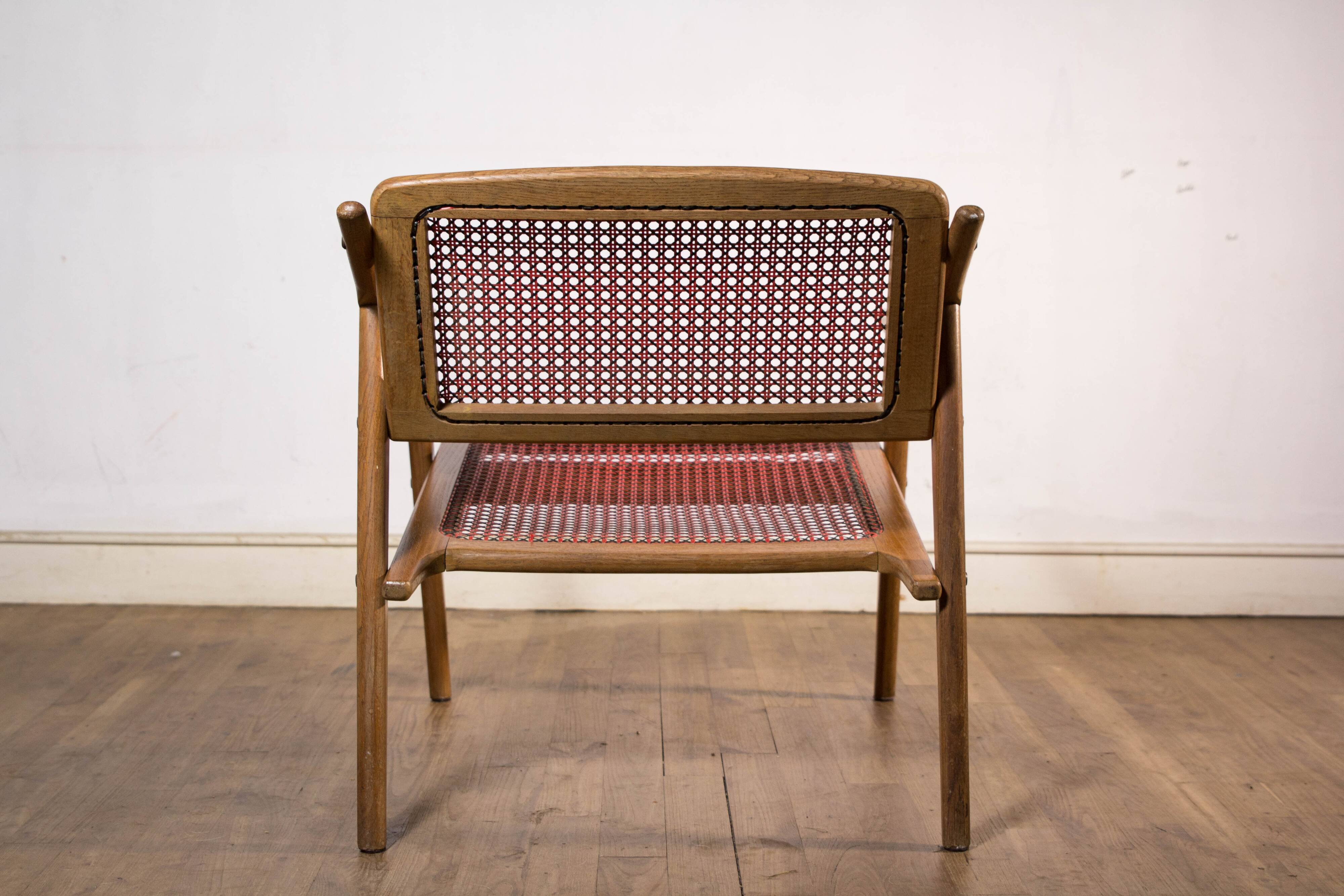 Teak armchair by Michel Ducaroy