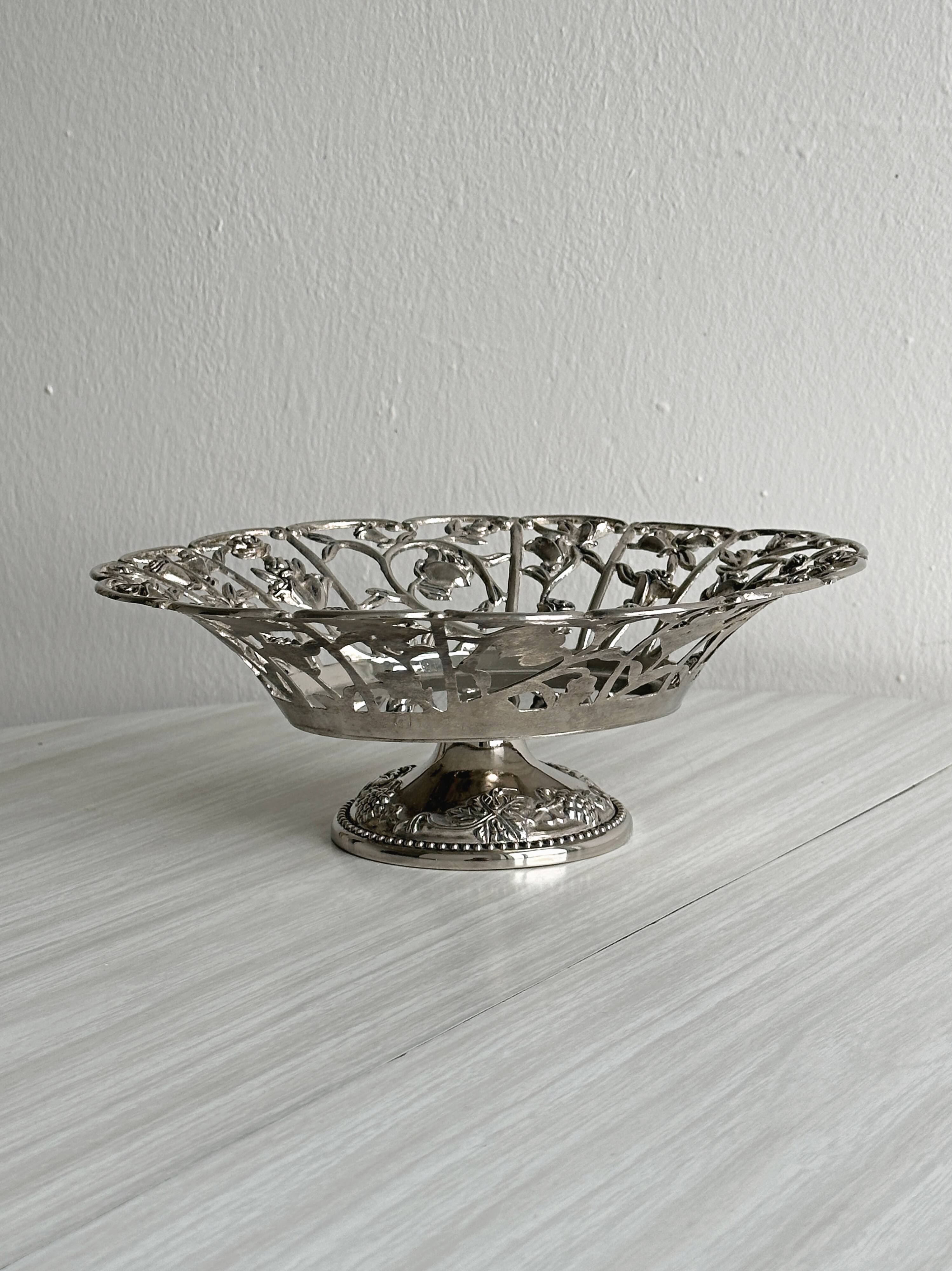 Silver-plated openwork metal stand