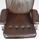 A pair of leather armchairs, 1970s