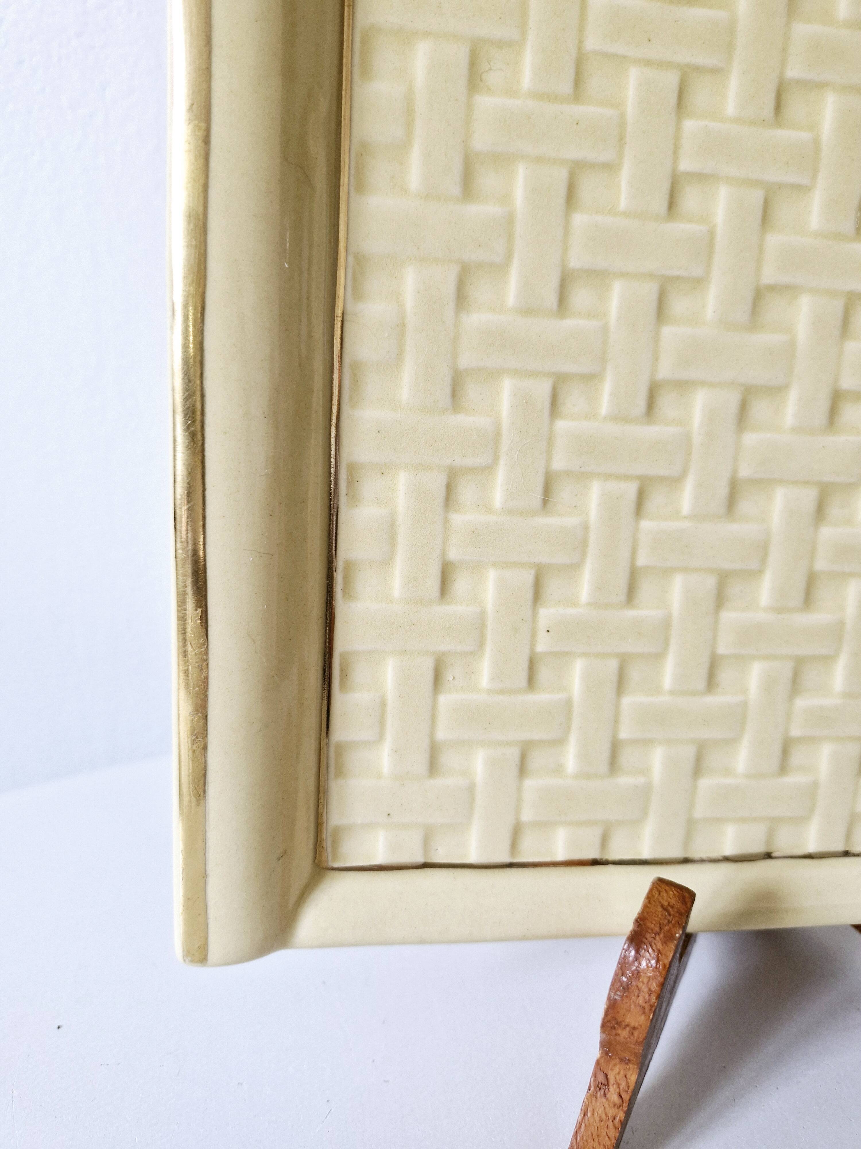 Plateau Poët Laval 1950s yellow straw ceramic with woven patterns.