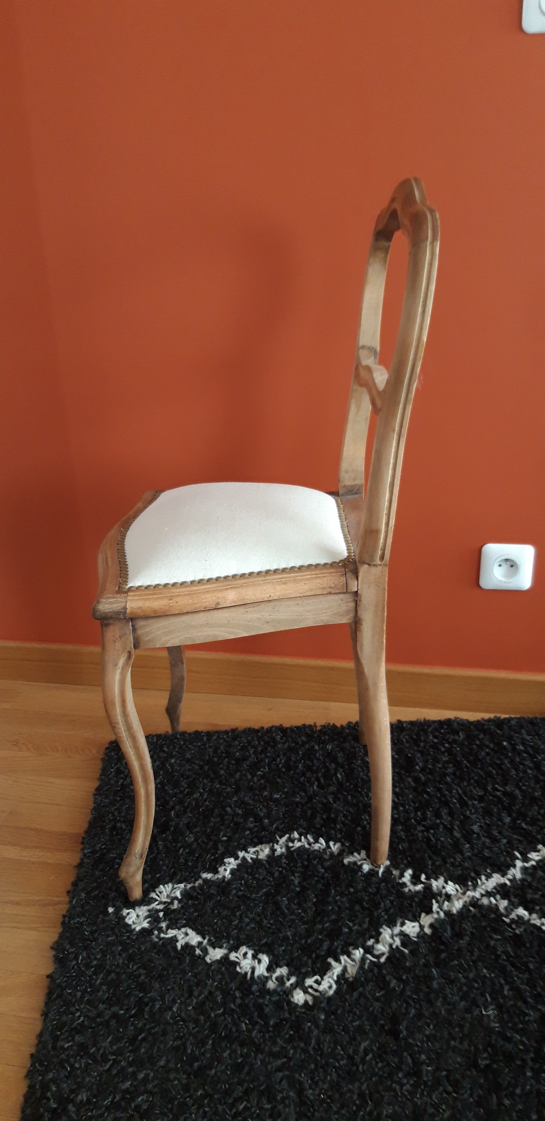 Old chair completely redone and reupholstered