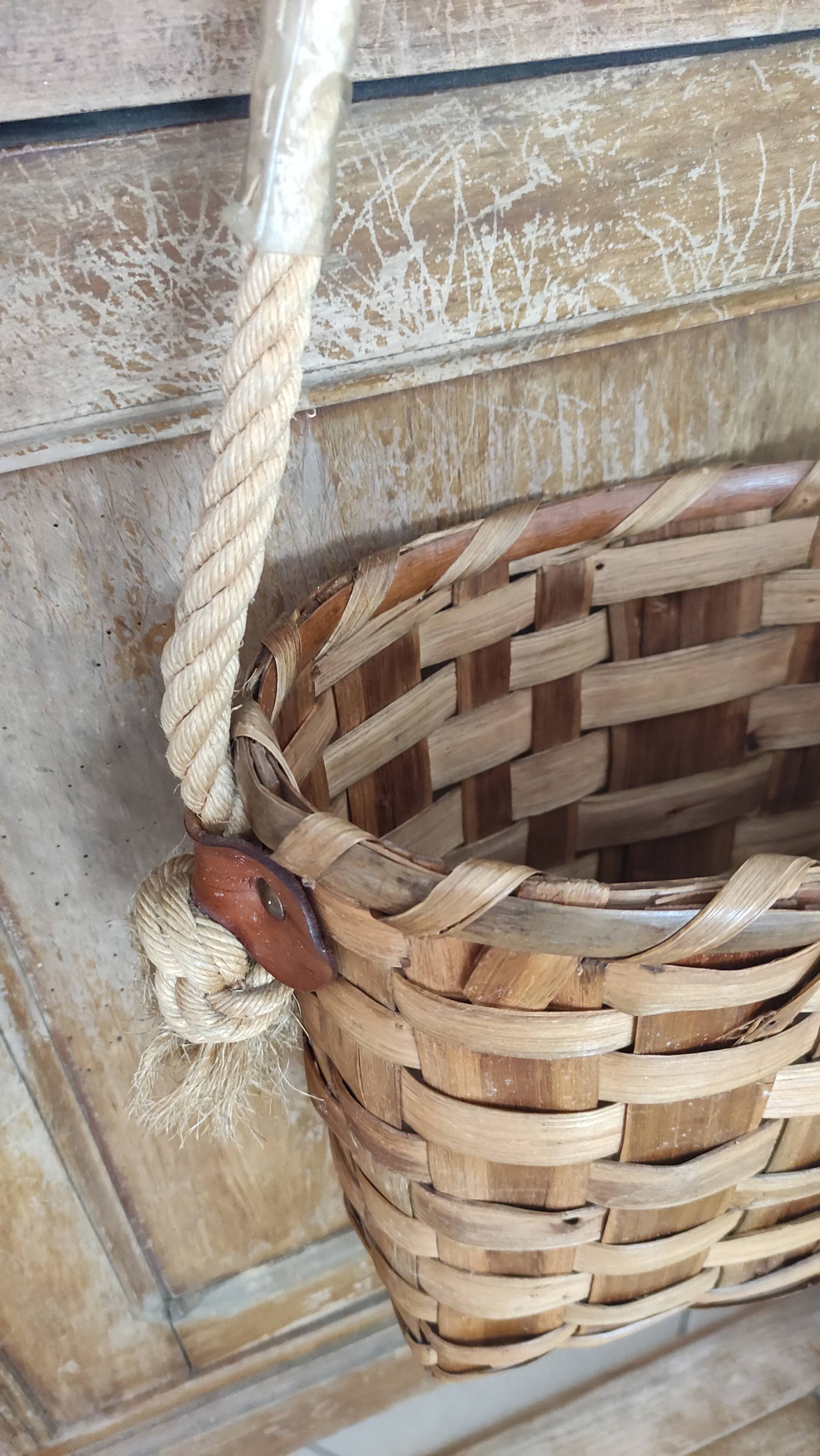 Basket or bag to put or hang leather, rope, brass and rattan