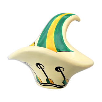 Ceramic vase in the shape sailing boat with its oars