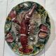 Set of 8 majolica-barbotine dishes and plates