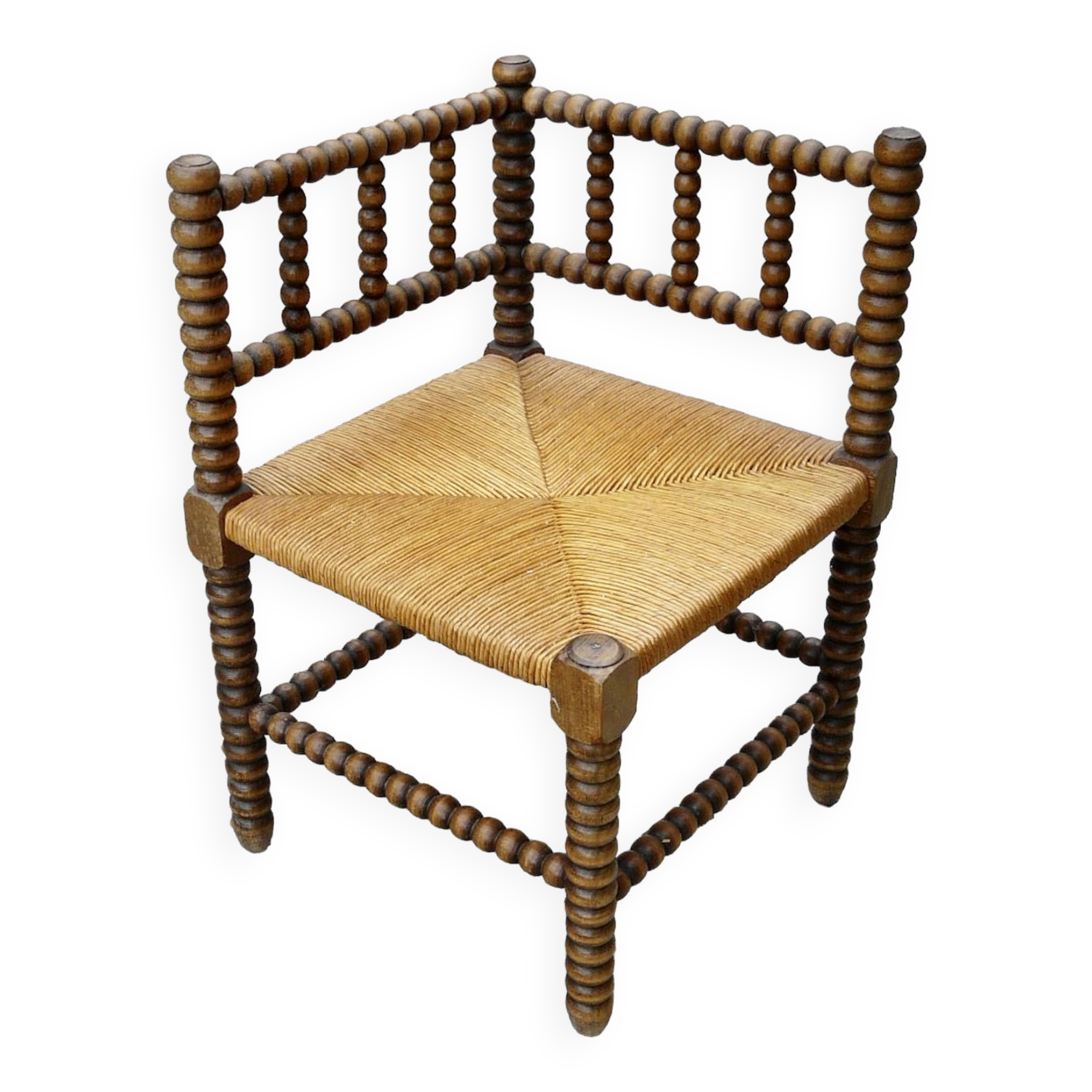 Turned wood straw corner armchair