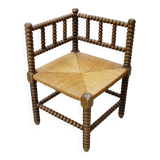 Turned wood straw corner armchair
