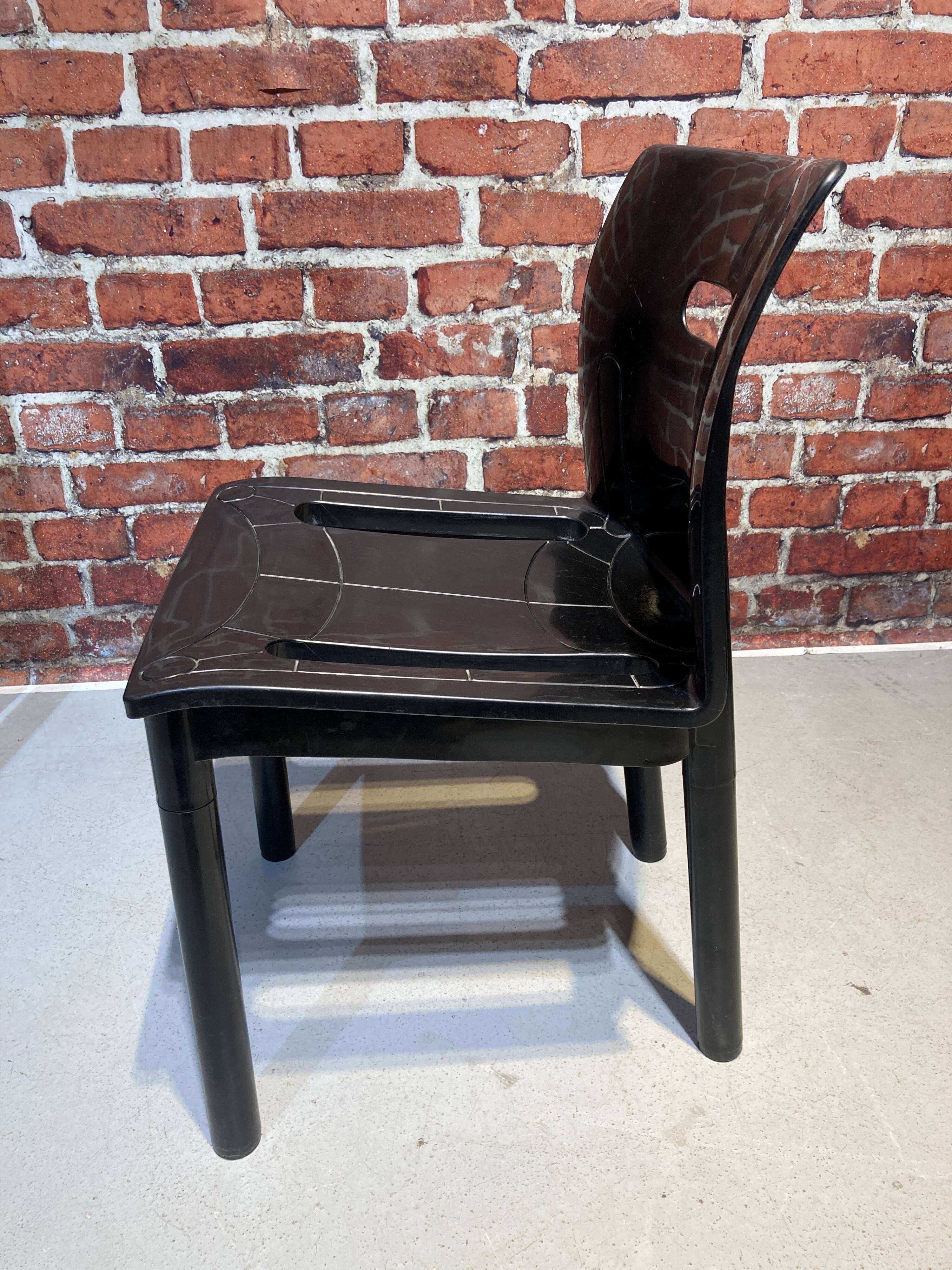 Suite of seven model 4870 chairs designed by Anna Castelli Ferrieri for Kartell