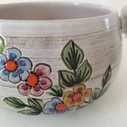 Glazed stoneware dish with floral motif
