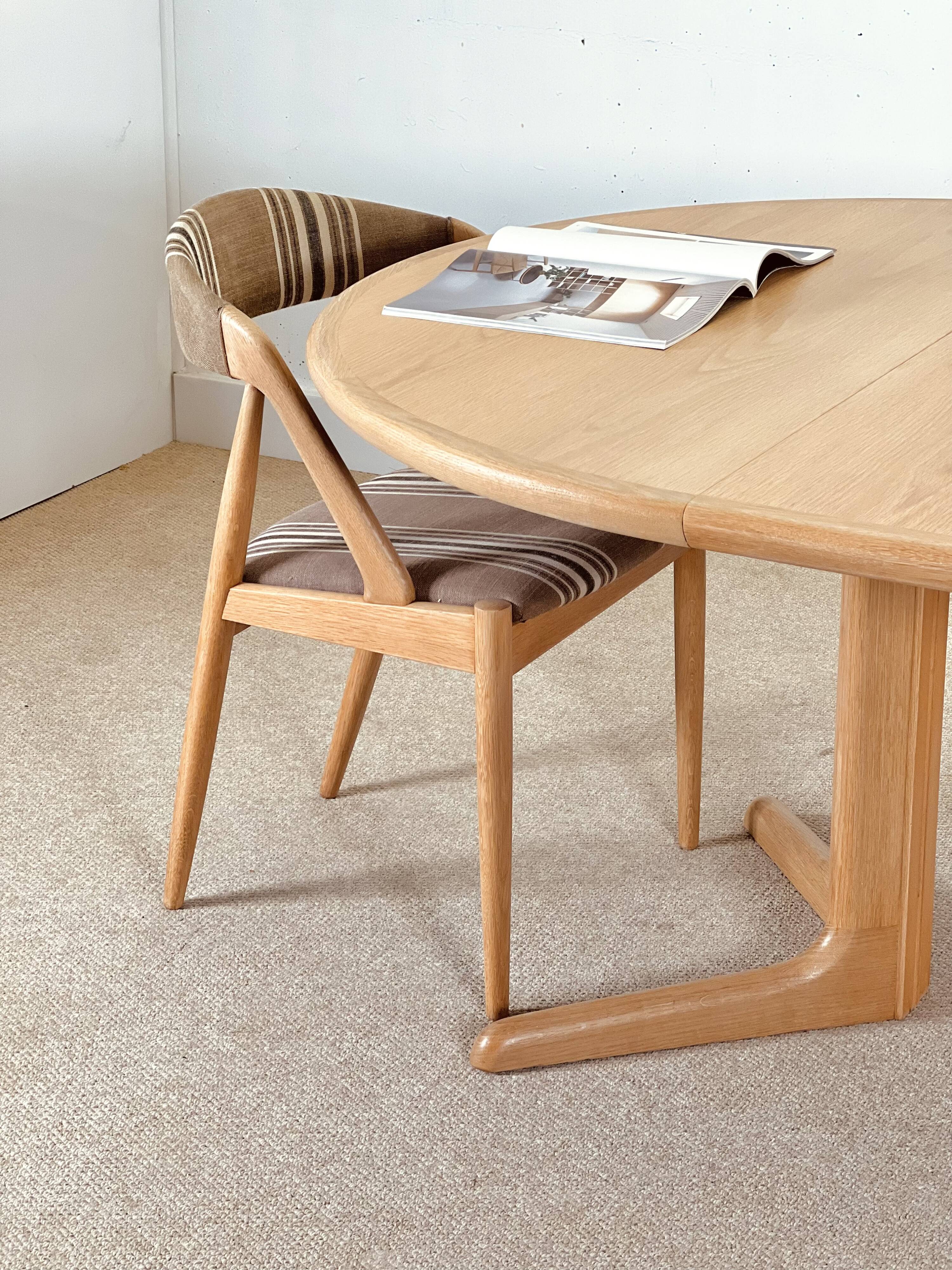 Set of four oak dining chairs by Kai Kristensen (Model 31)