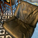 Fauteuil et repose pieds ottomane Falcon en cuir