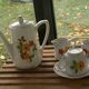 Porcelain dinette for dolls consisting of a coffee maker, cups and saucers, vintage
