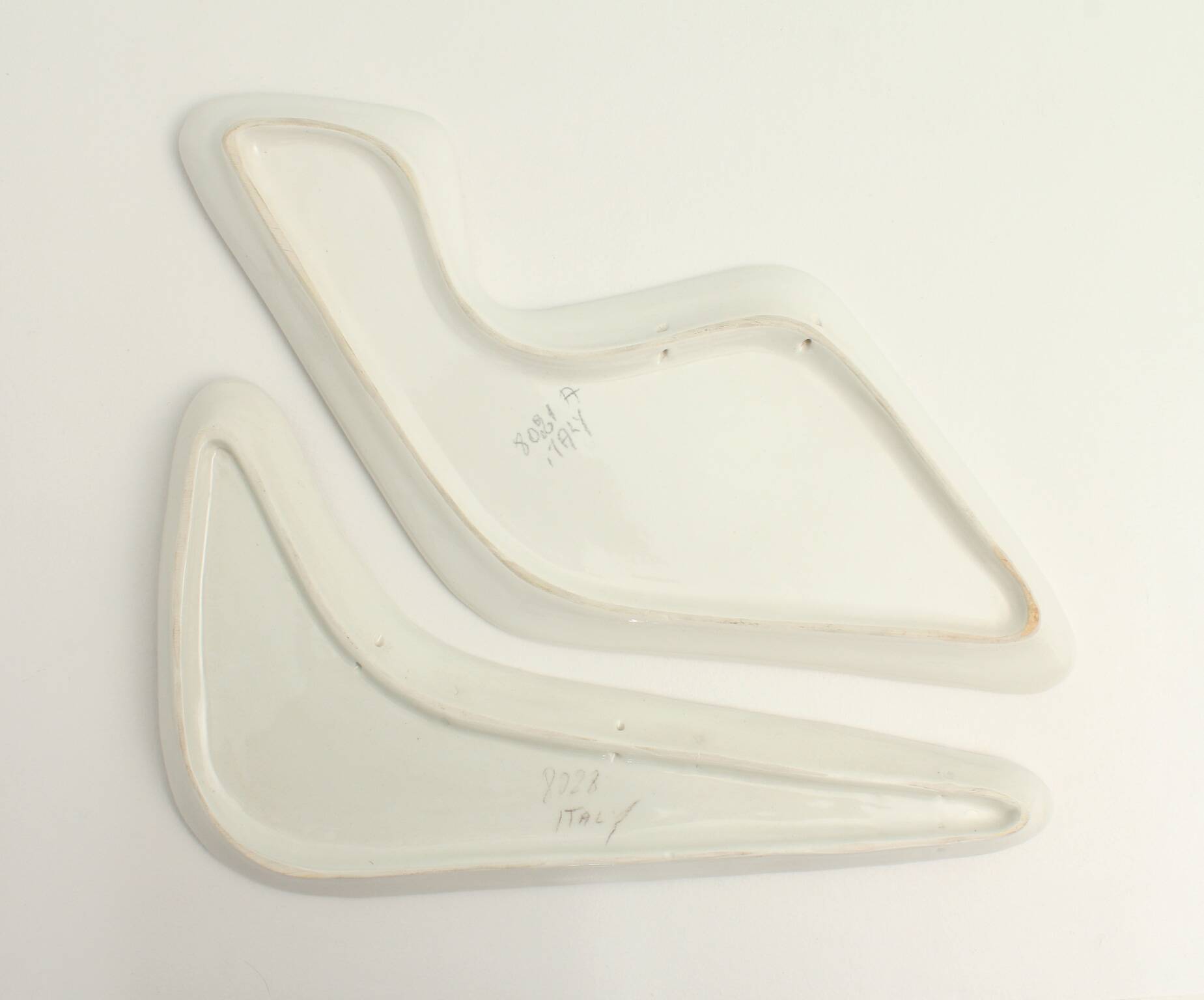 Pair of free-form dishes from Sesto di Fiamma, Italy, 1950s