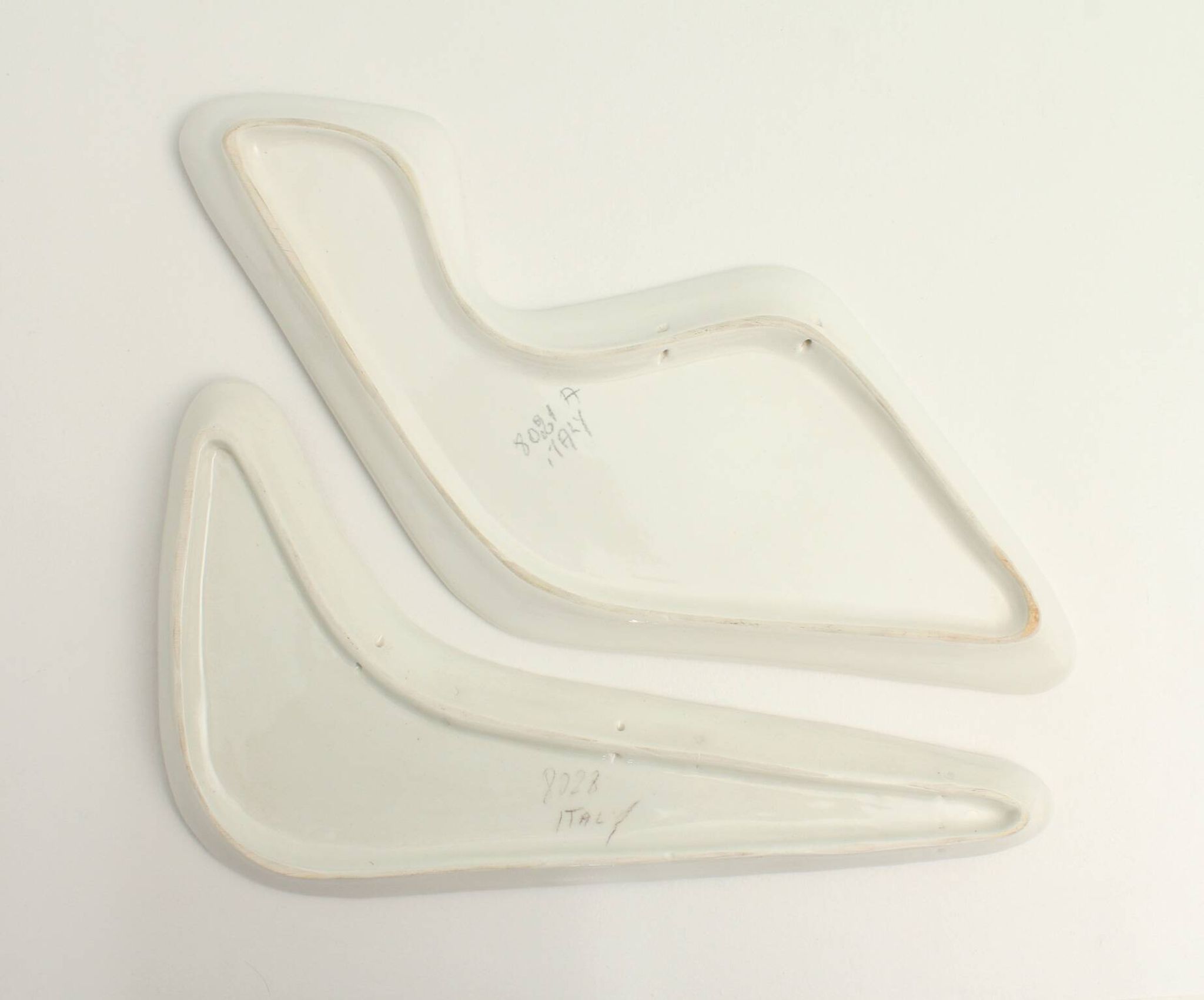 Pair of free-form dishes from Sesto di Fiamma, Italy, 1950s