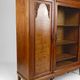 Art Deco showcase bookcase in carved walnut, France, circa 1925