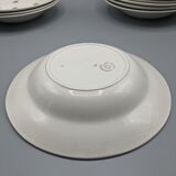 12 hollow porcelain plates, floral decoration and golden ledé - ∅: 23cm