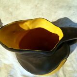 Yellow and Black ceramic pitcher