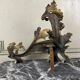 Paire de chenêts en bronze ciselé et doré d'après un modèle de Jacques Caffieri, Paris XIXème